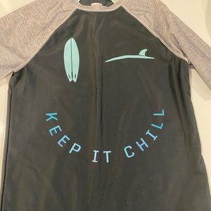 Rash guard short sleeve shirt in navy and gray. Size10-12 Hardly worn.